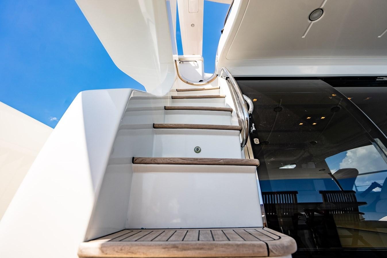 a staircase leading to a building aboard DAYS LIKE THIS Yacht for Sale