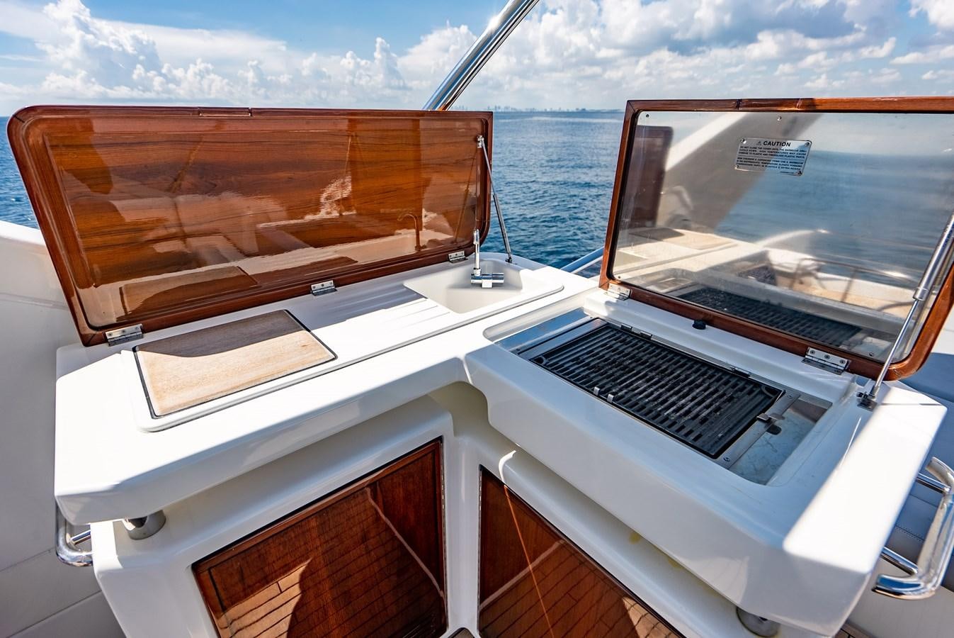 a boat with a laptop on it aboard DAYS LIKE THIS Yacht for Sale