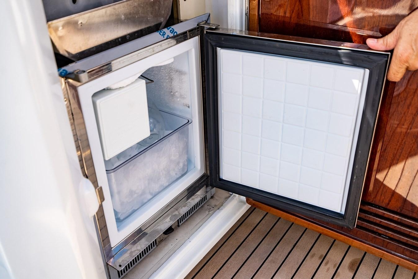 a person opening a box aboard DAYS LIKE THIS Yacht for Sale