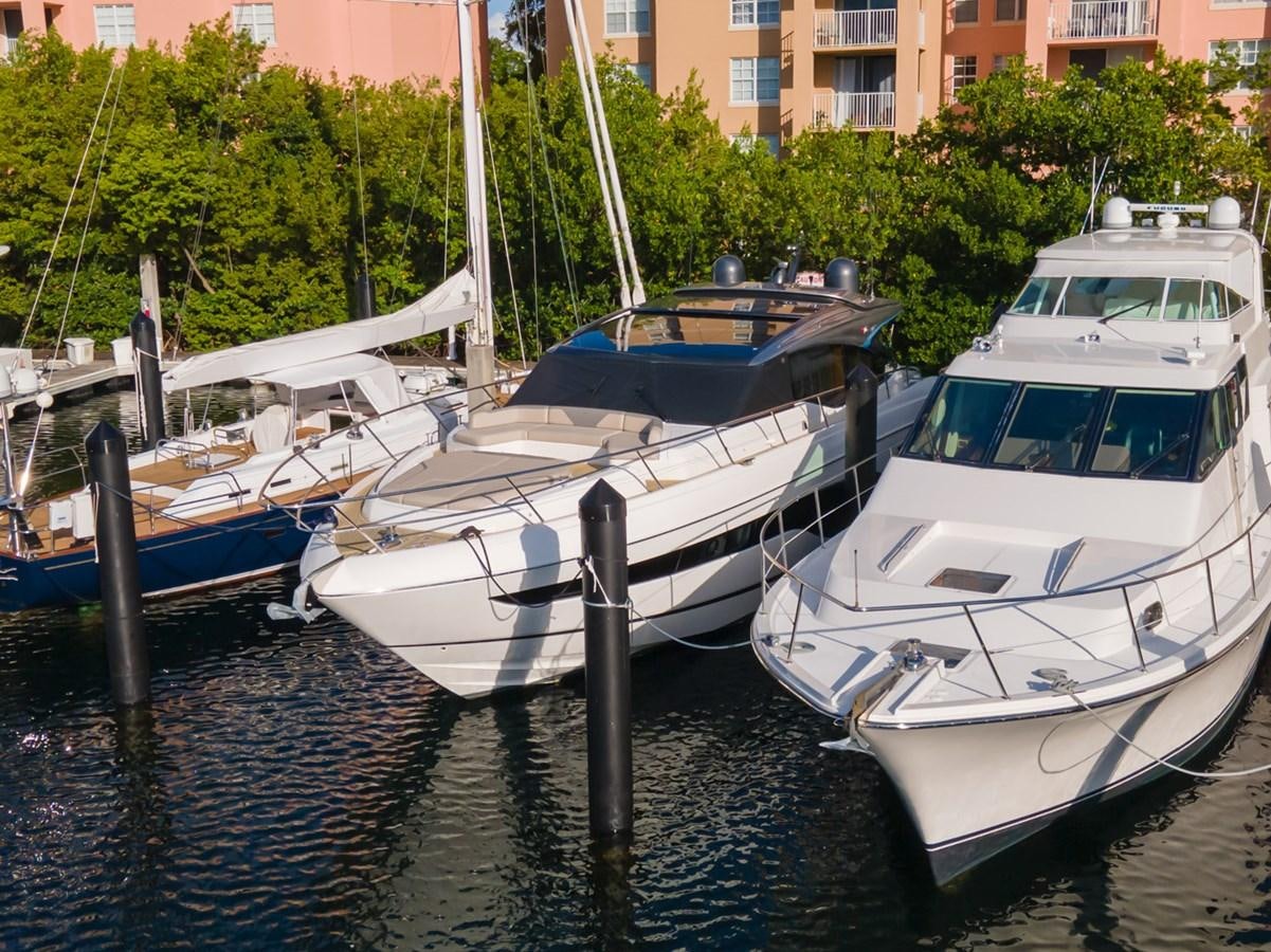 several boats docked at a pier aboard V65 PRINCESS Yacht for Sale