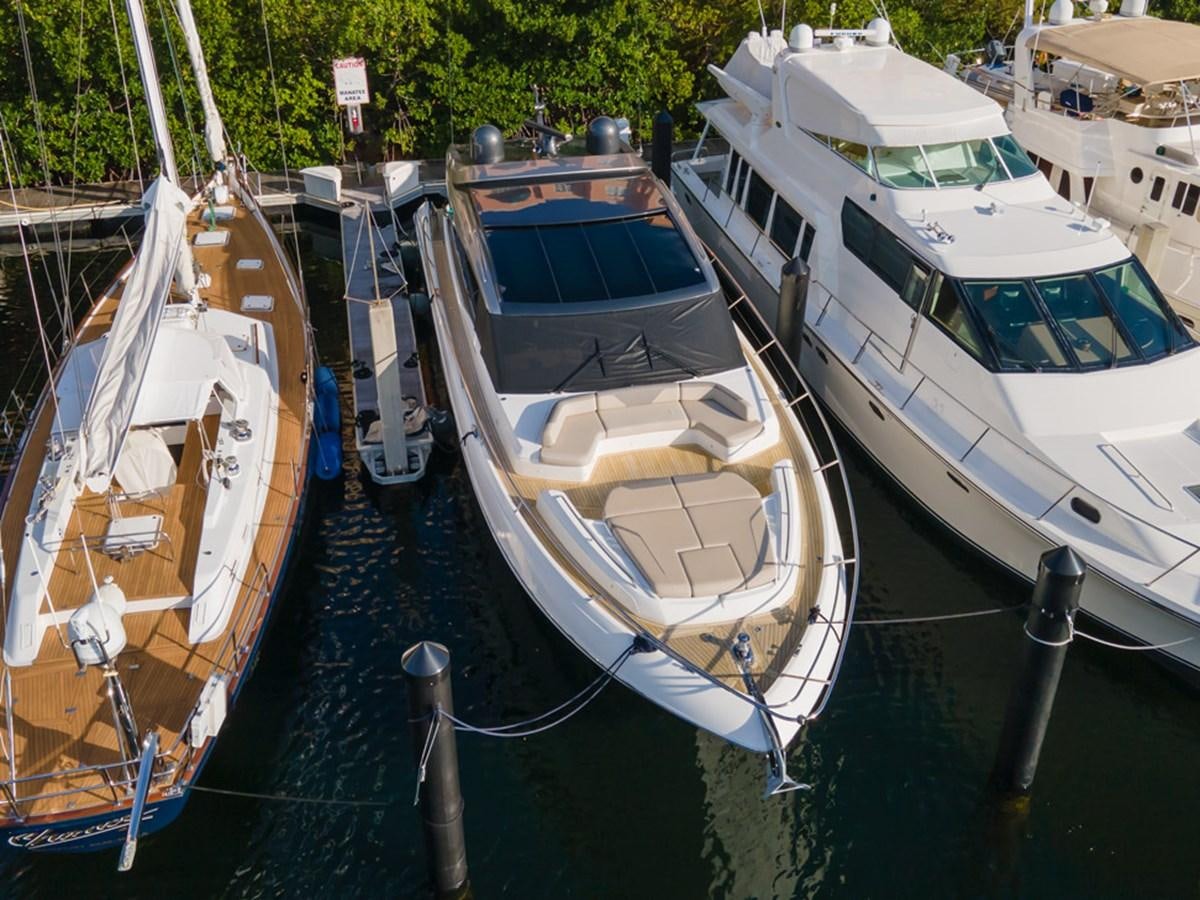 boats docked at a pier aboard V65 PRINCESS Yacht for Sale