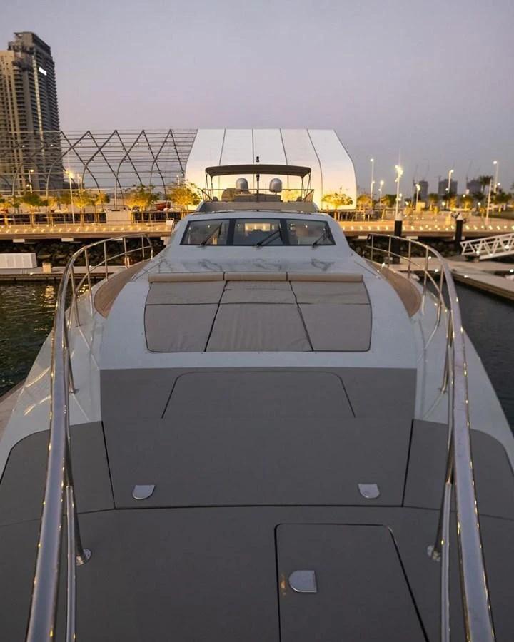 a boat in a harbor aboard HIGH ROLLER Yacht for Sale