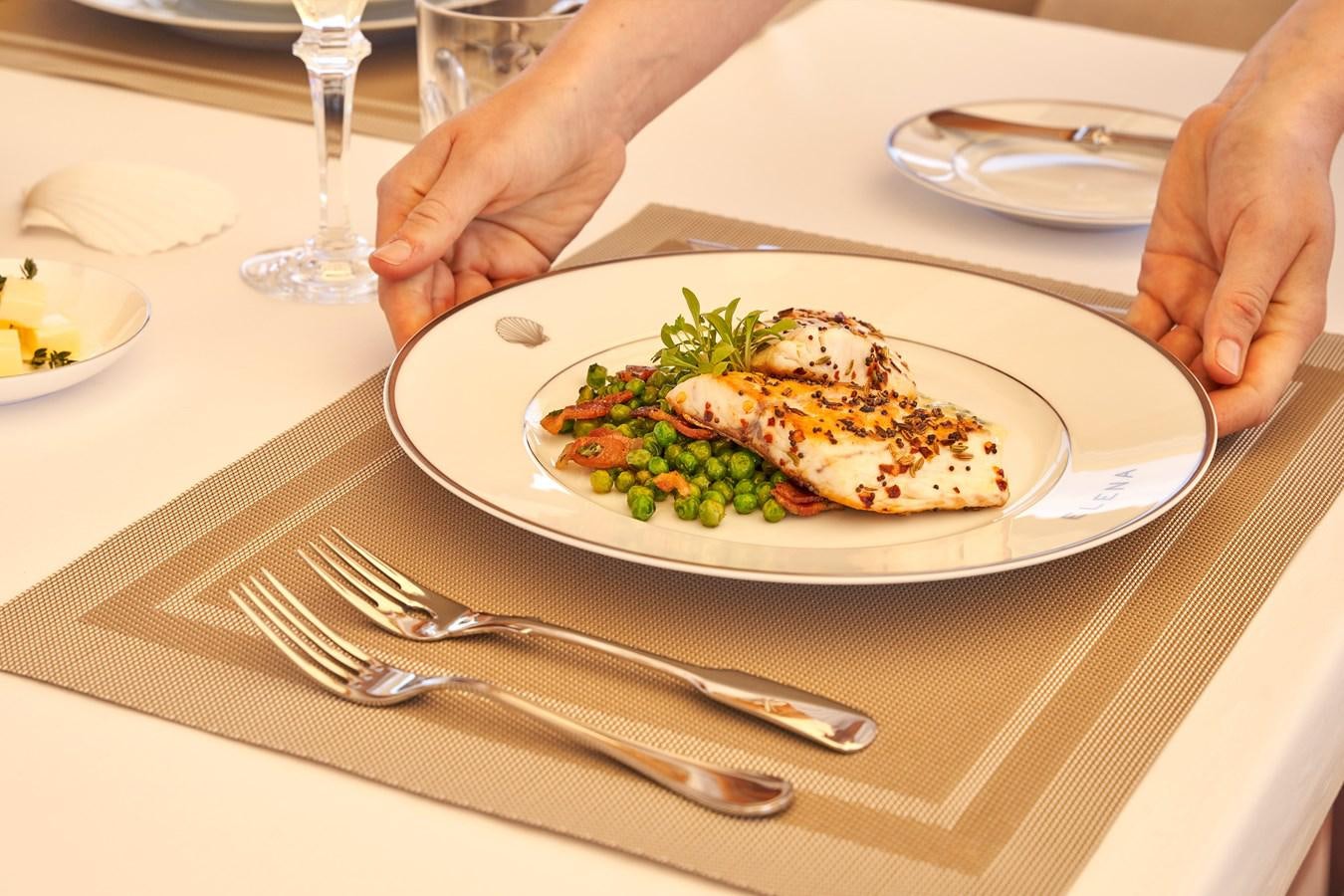 a plate of food aboard ELENA OF LONDON Yacht for Sale