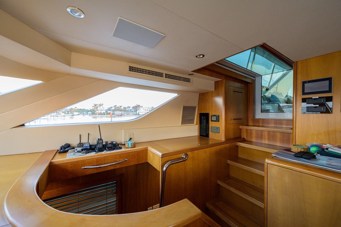 a room with a desk and a window aboard SAR Yacht for Sale