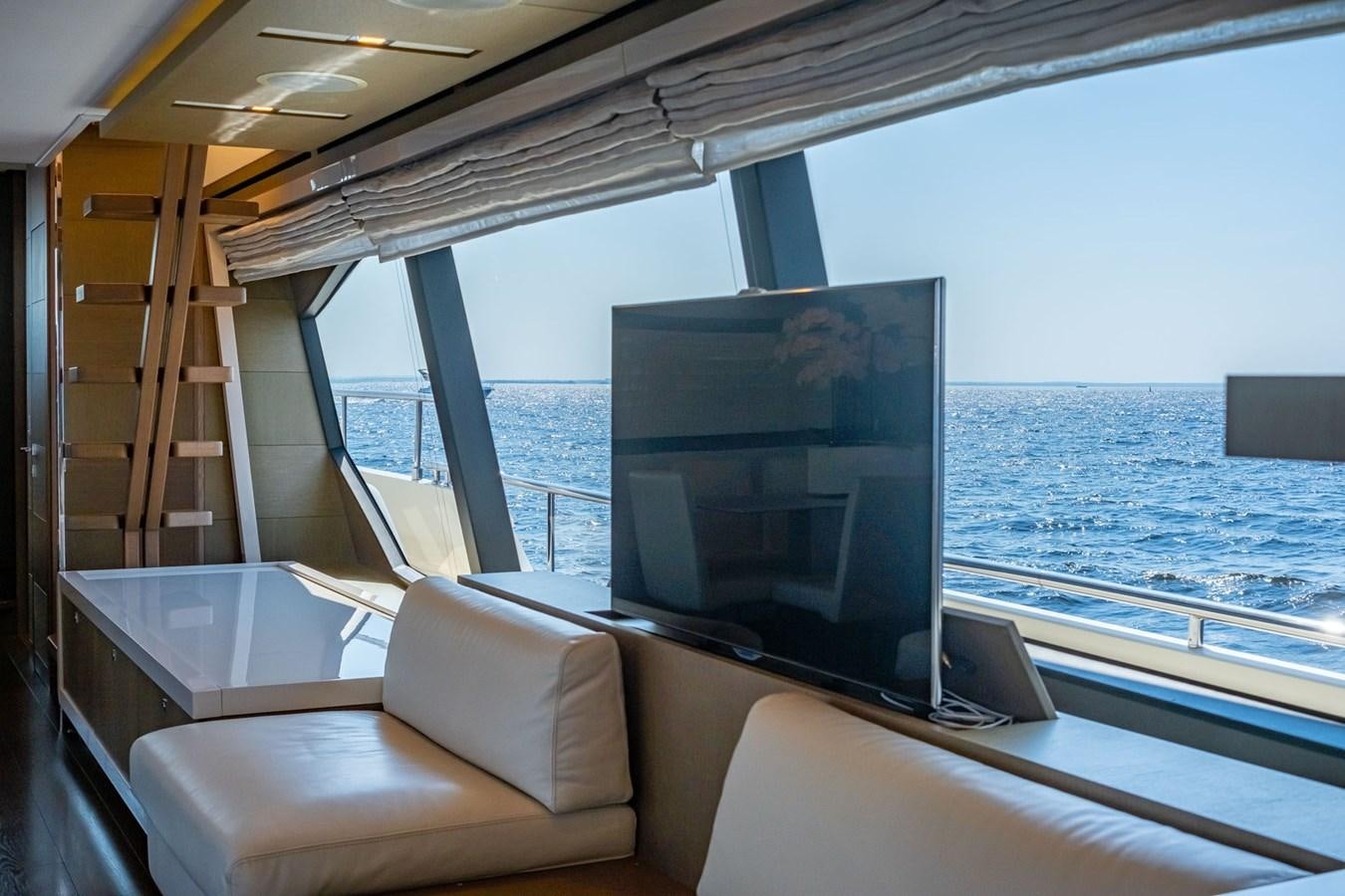 a boat with a large screen aboard FERRETTI 870 Yacht for Sale