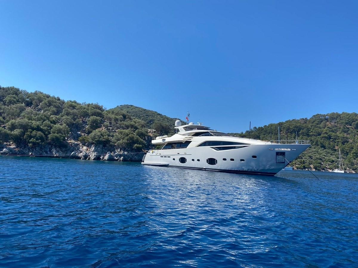 a white boat on the water aboard SELF Yacht for Sale
