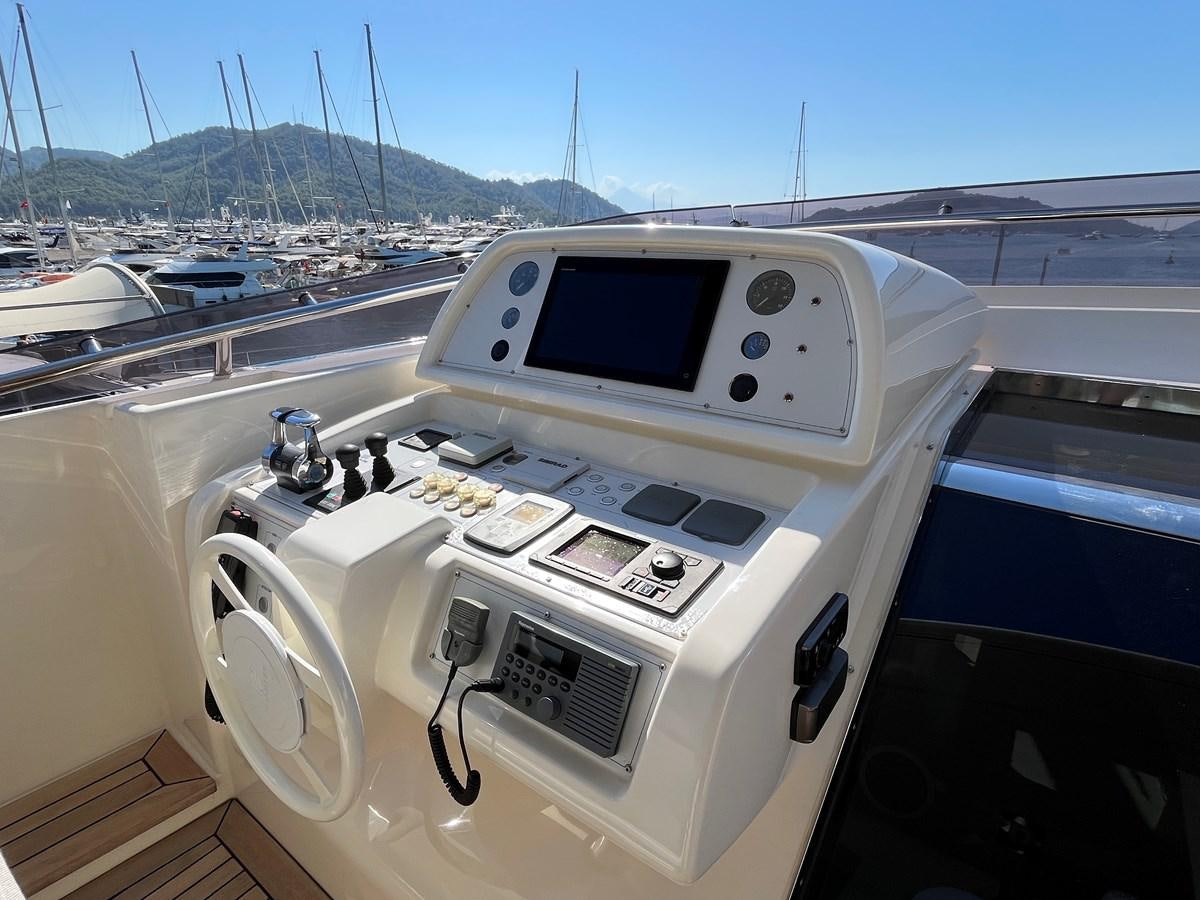 a white device with a screen aboard SELF Yacht for Sale