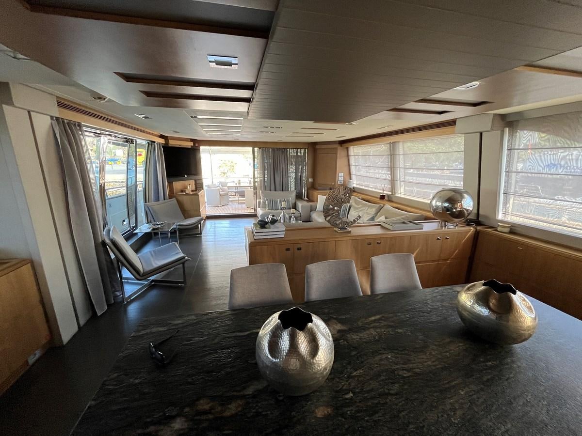 a large kitchen with a large island aboard SELF Yacht for Sale