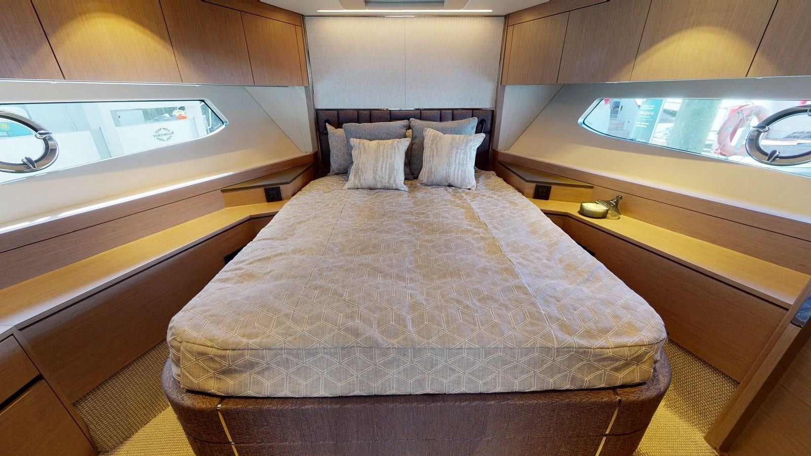 a bed in a room aboard RANI Yacht for Sale