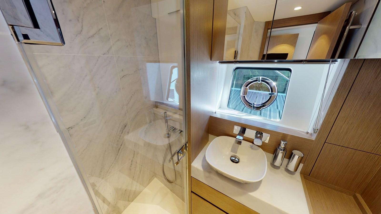 a bathroom with a sink and a mirror aboard RANI Yacht for Sale