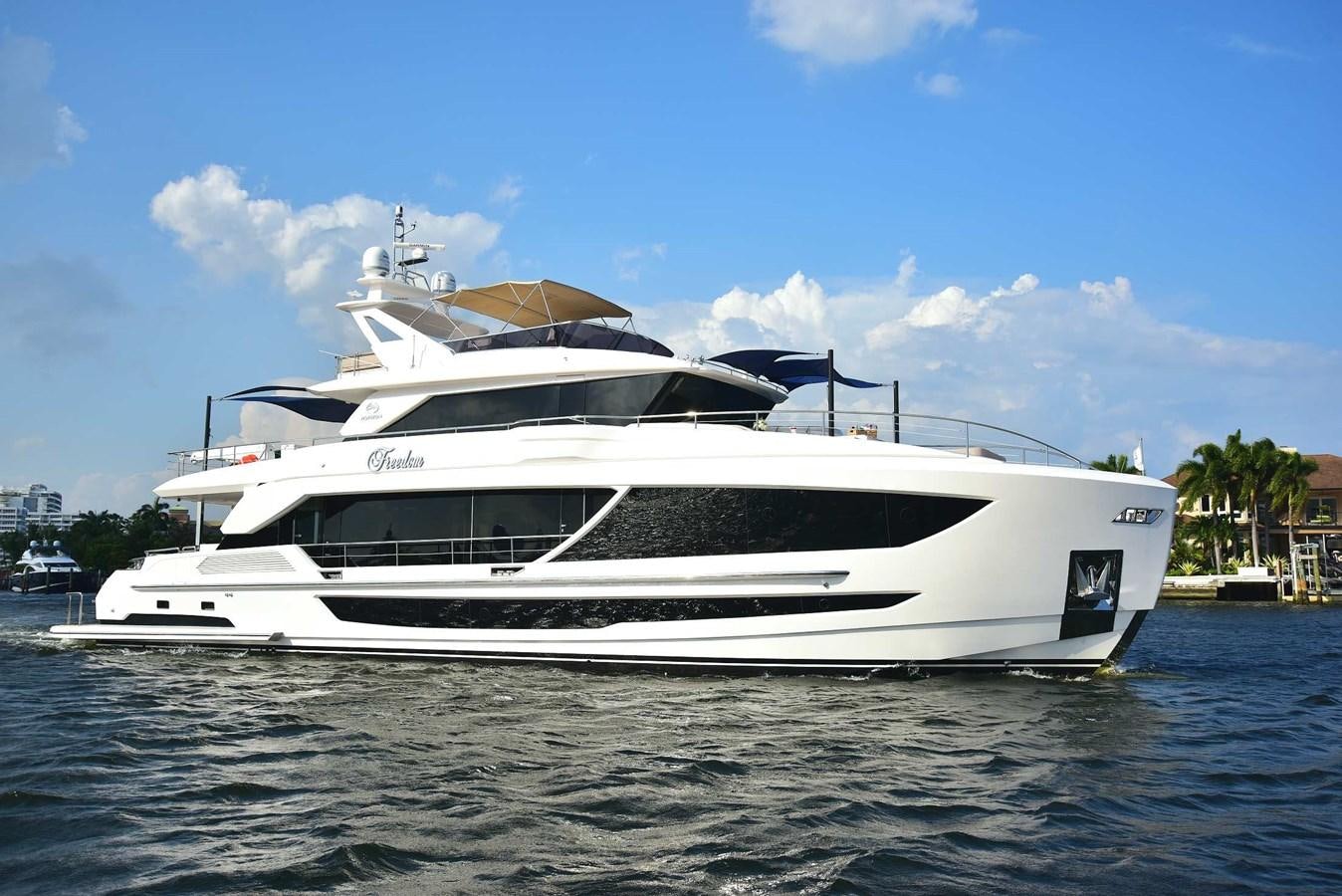 a white yacht in the water aboard FREEDOM Yacht for Sale