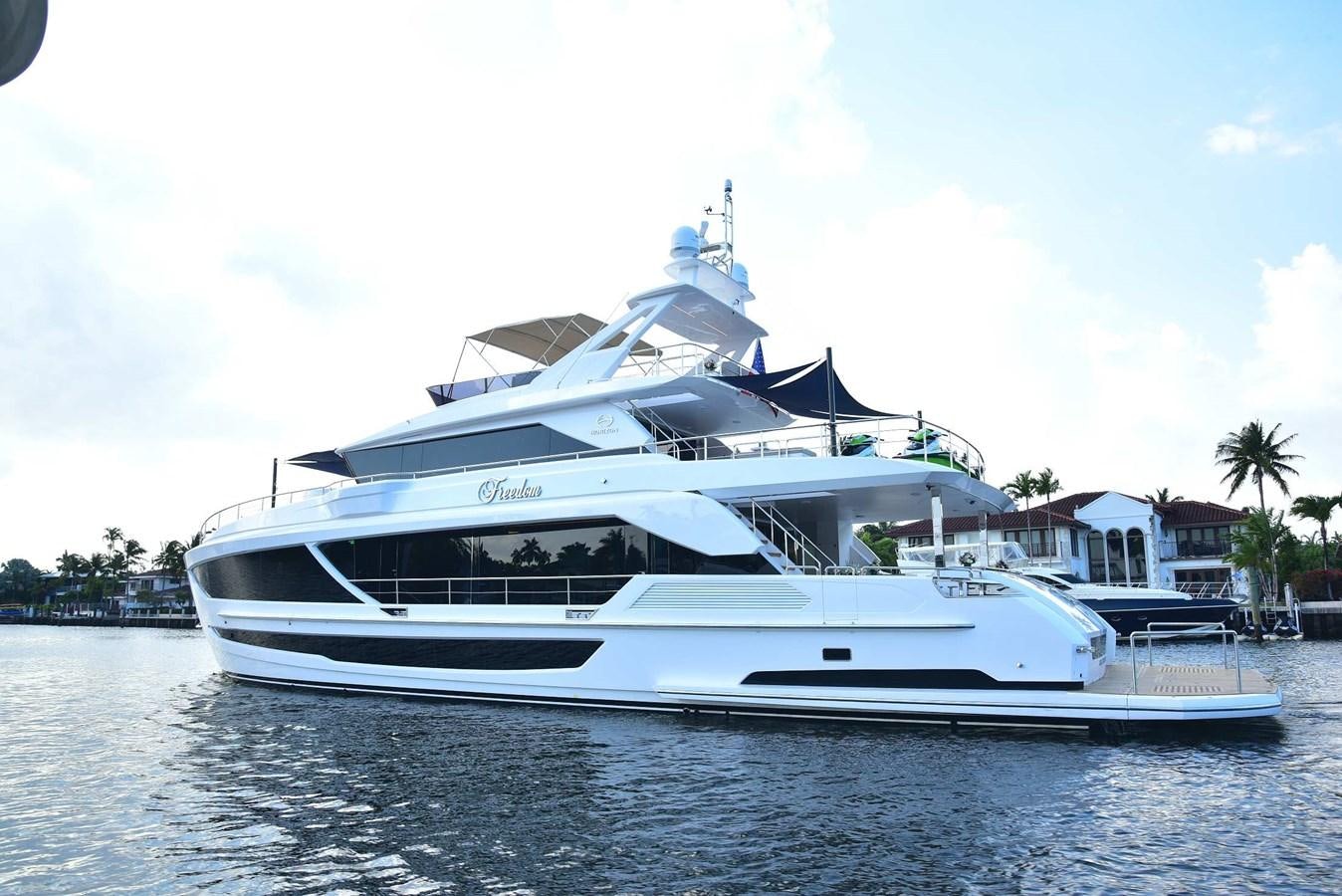 a white yacht on the water aboard FREEDOM Yacht for Sale