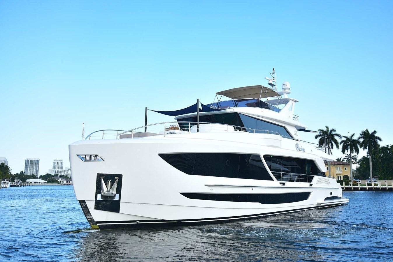 a white yacht on the water aboard FREEDOM Yacht for Sale