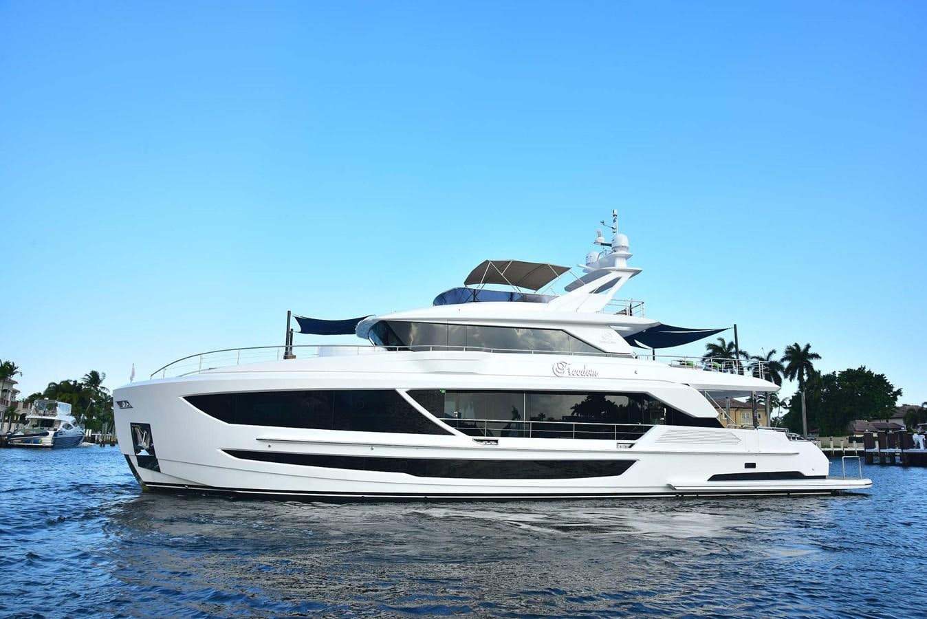 a white yacht on the water aboard FREEDOM Yacht for Sale