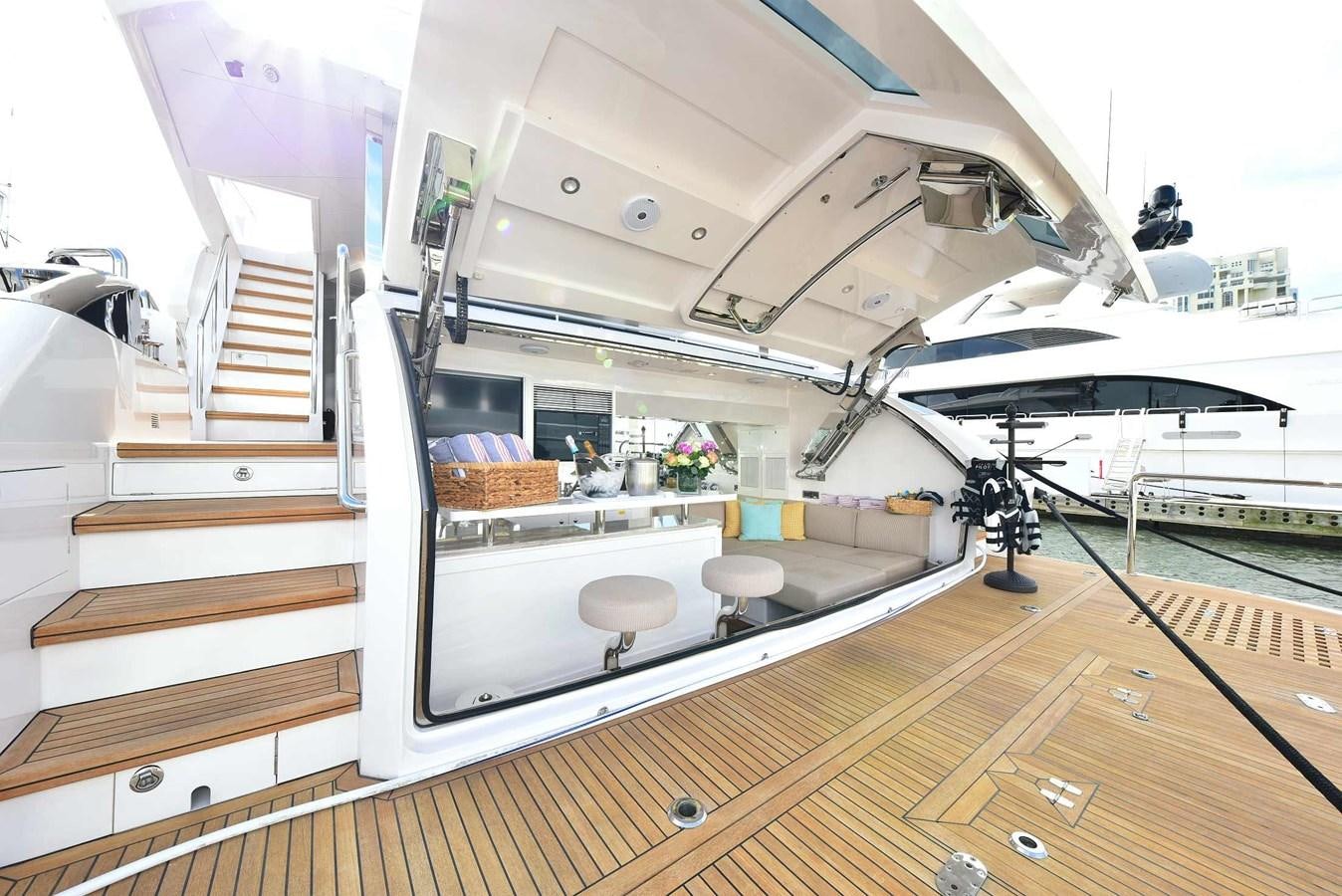 a white staircase with a white ceiling aboard FREEDOM Yacht for Sale
