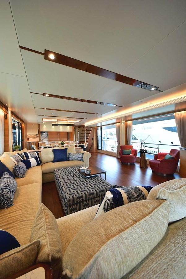 a living room with a large window aboard FREEDOM Yacht for Sale