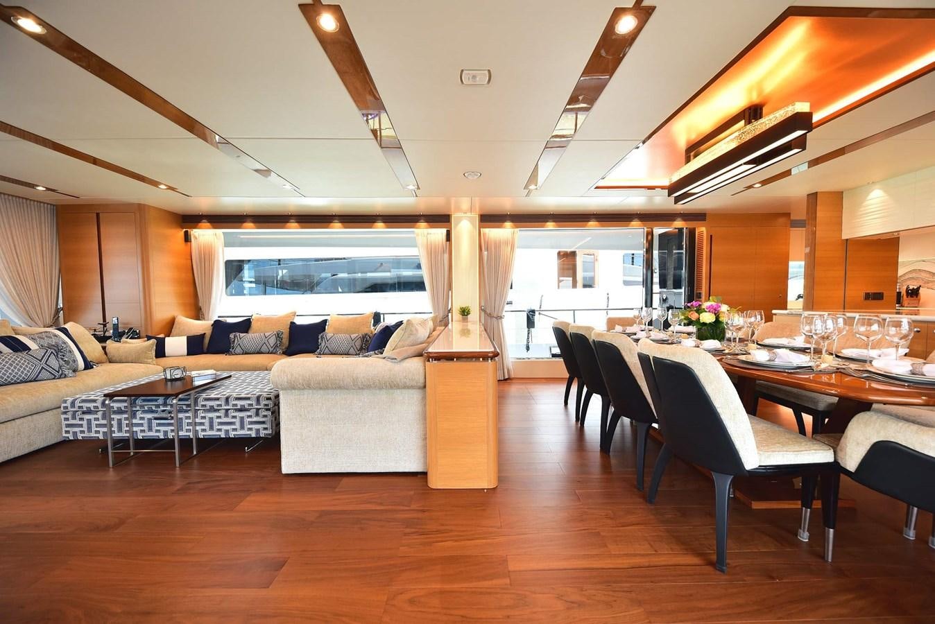 a living room with a large window aboard FREEDOM Yacht for Sale