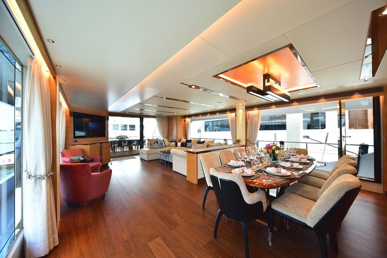 a large open kitchen and dining area aboard FREEDOM Yacht for Sale