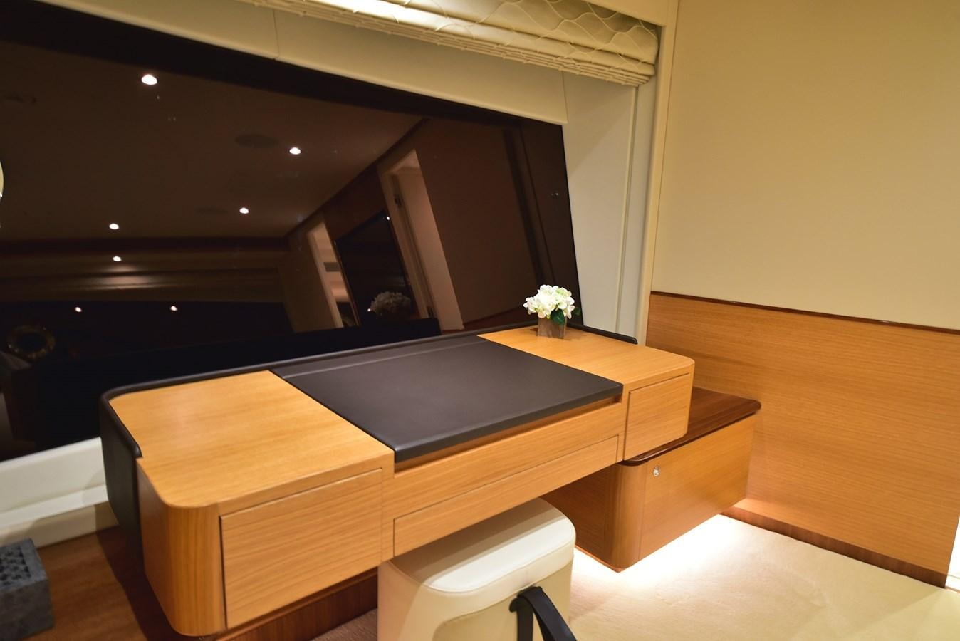 a room with a desk and a chair aboard FREEDOM Yacht for Sale