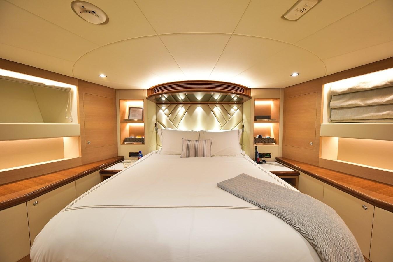 a bed in a room aboard FREEDOM Yacht for Sale