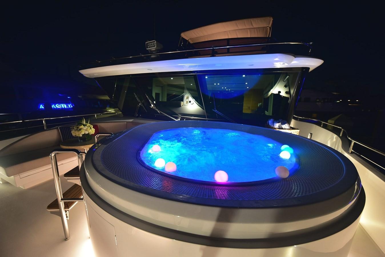 a blue and white circular object with a round object in the middle aboard FREEDOM Yacht for Sale