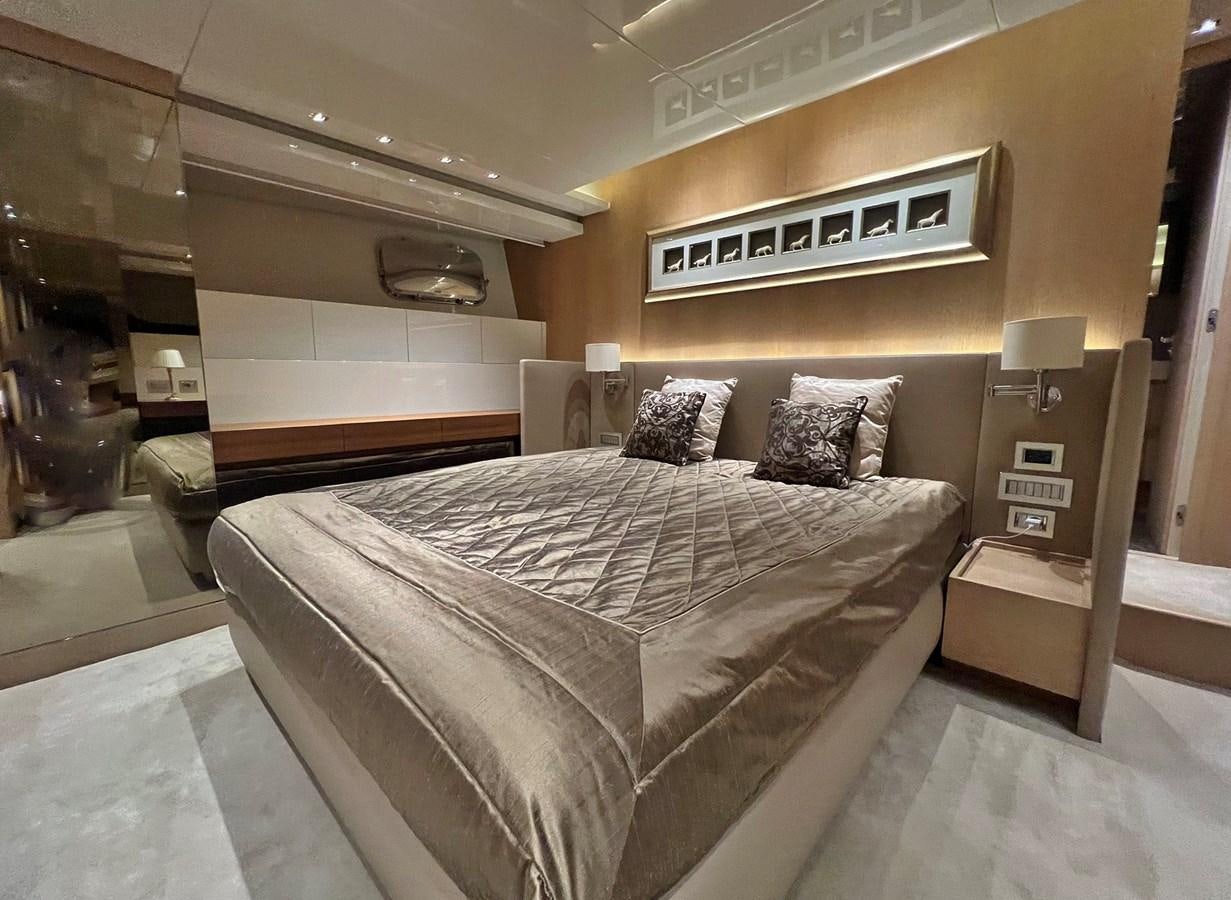 a bed in a room aboard INDIGO Yacht for Sale