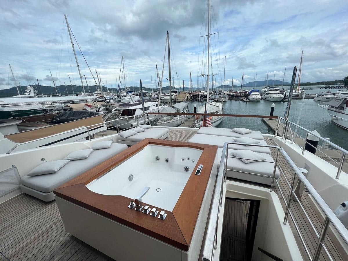 a boat in a harbor aboard INDIGO Yacht for Sale