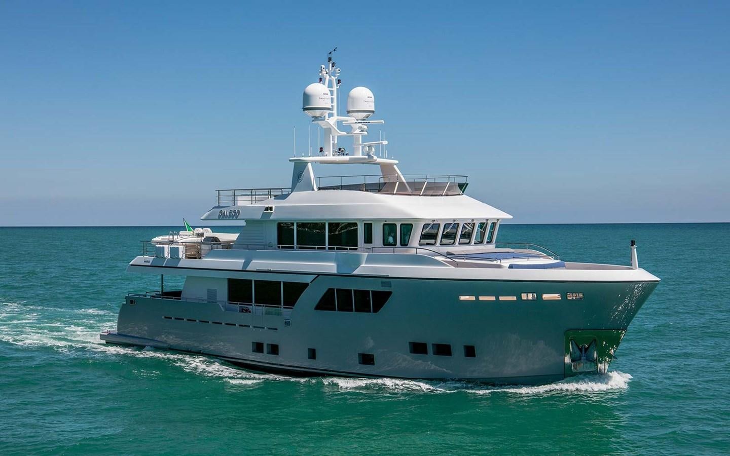 a large boat in the water aboard ATLAS Yacht for Sale
