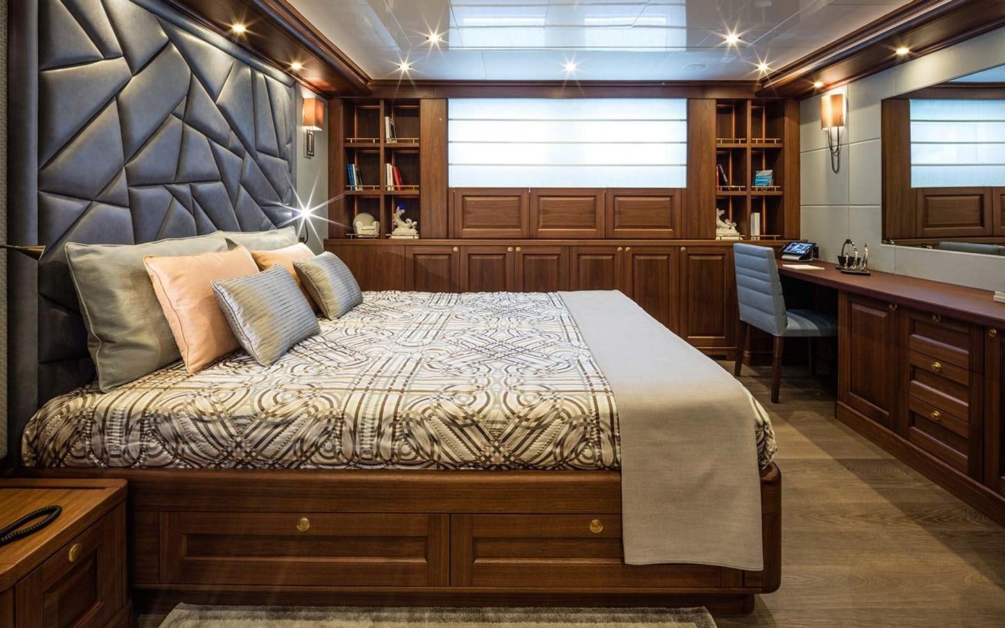 a bed in a room aboard ATLAS Yacht for Sale