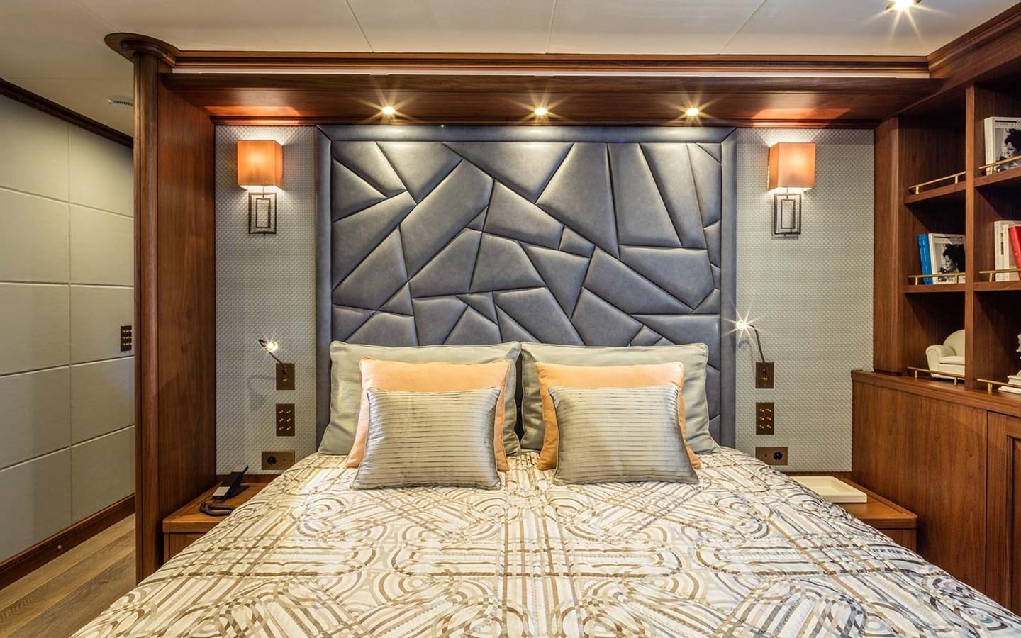 a bed with pillows aboard ATLAS Yacht for Sale