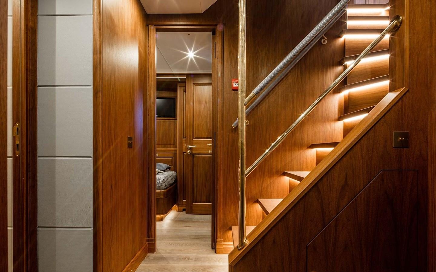 a room with wooden doors aboard ATLAS Yacht for Sale