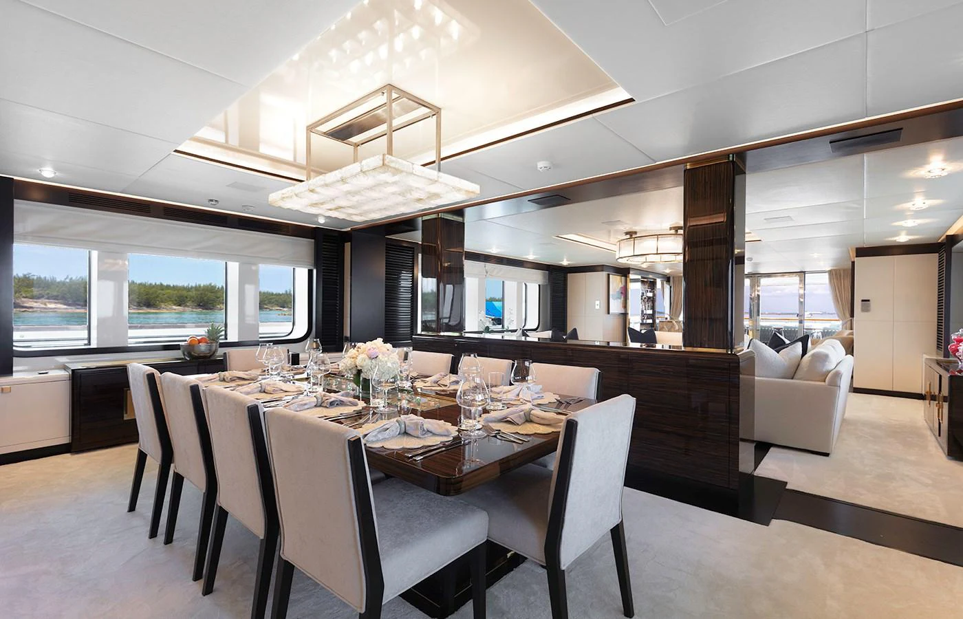 a dining table in a room aboard MYSTIC Yacht for Charter