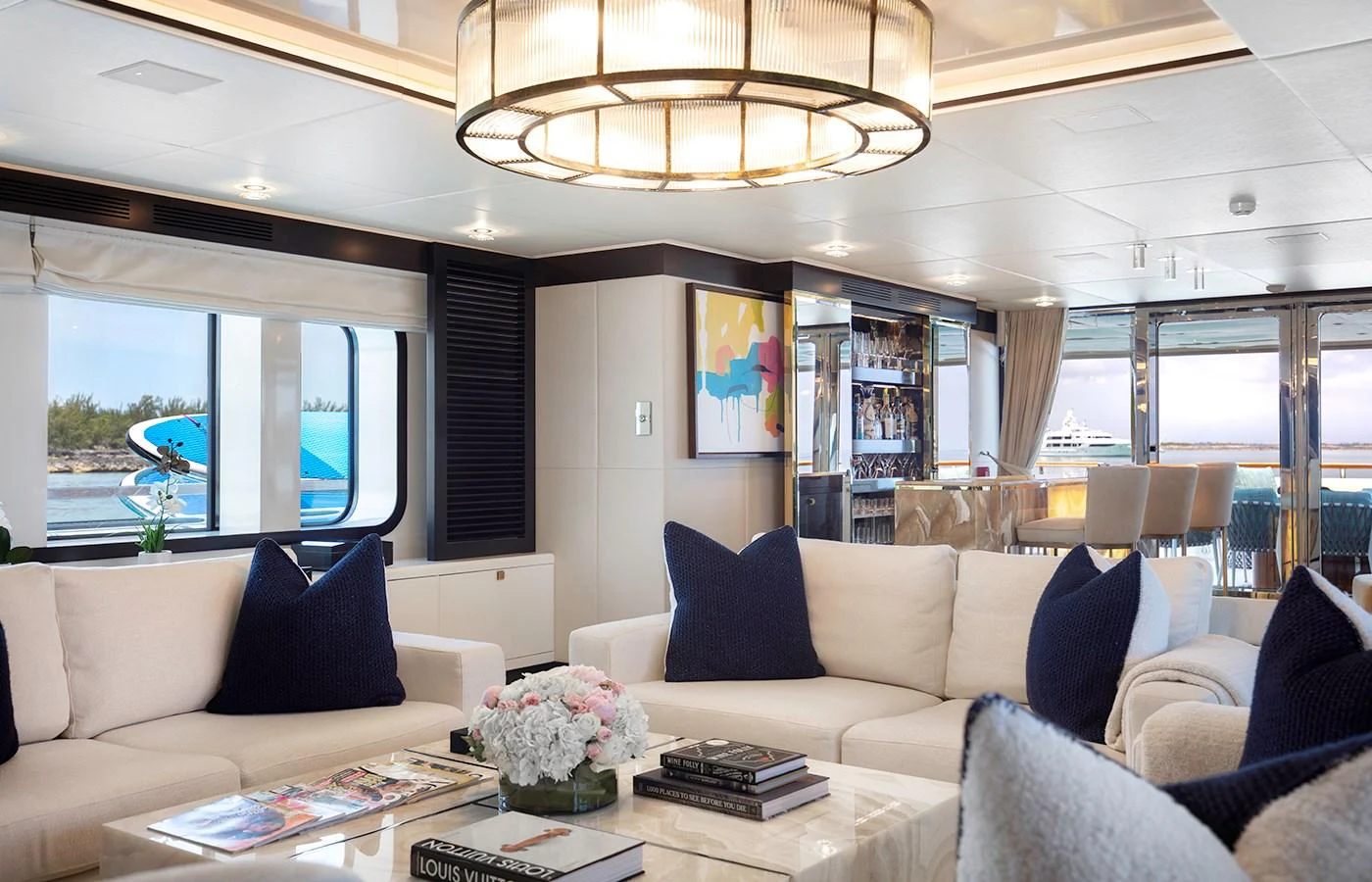 a living room with a large window aboard MYSTIC Yacht for Charter