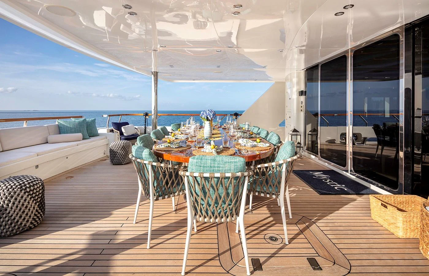 a room with a table and chairs aboard MYSTIC Yacht for Charter