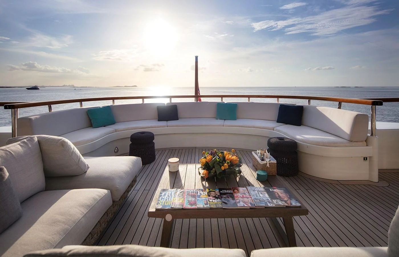 a living room with a large balcony aboard MYSTIC Yacht for Charter