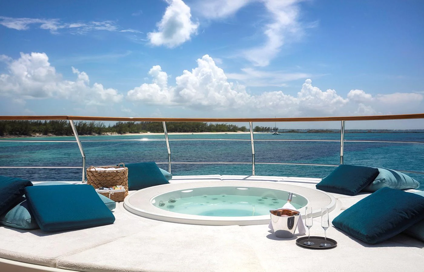 a large pool with a view of the city and the water aboard MYSTIC Yacht for Charter