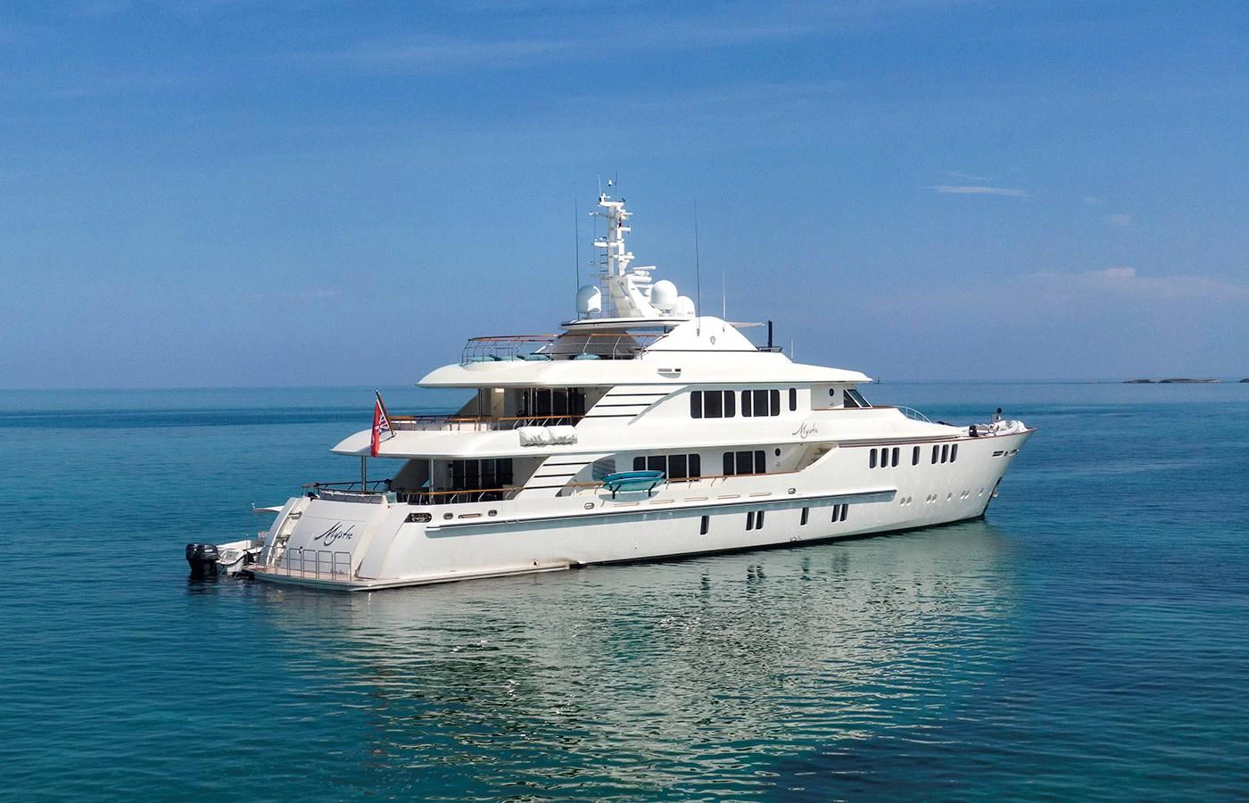 a white yacht in the water aboard MYSTIC Yacht for Charter