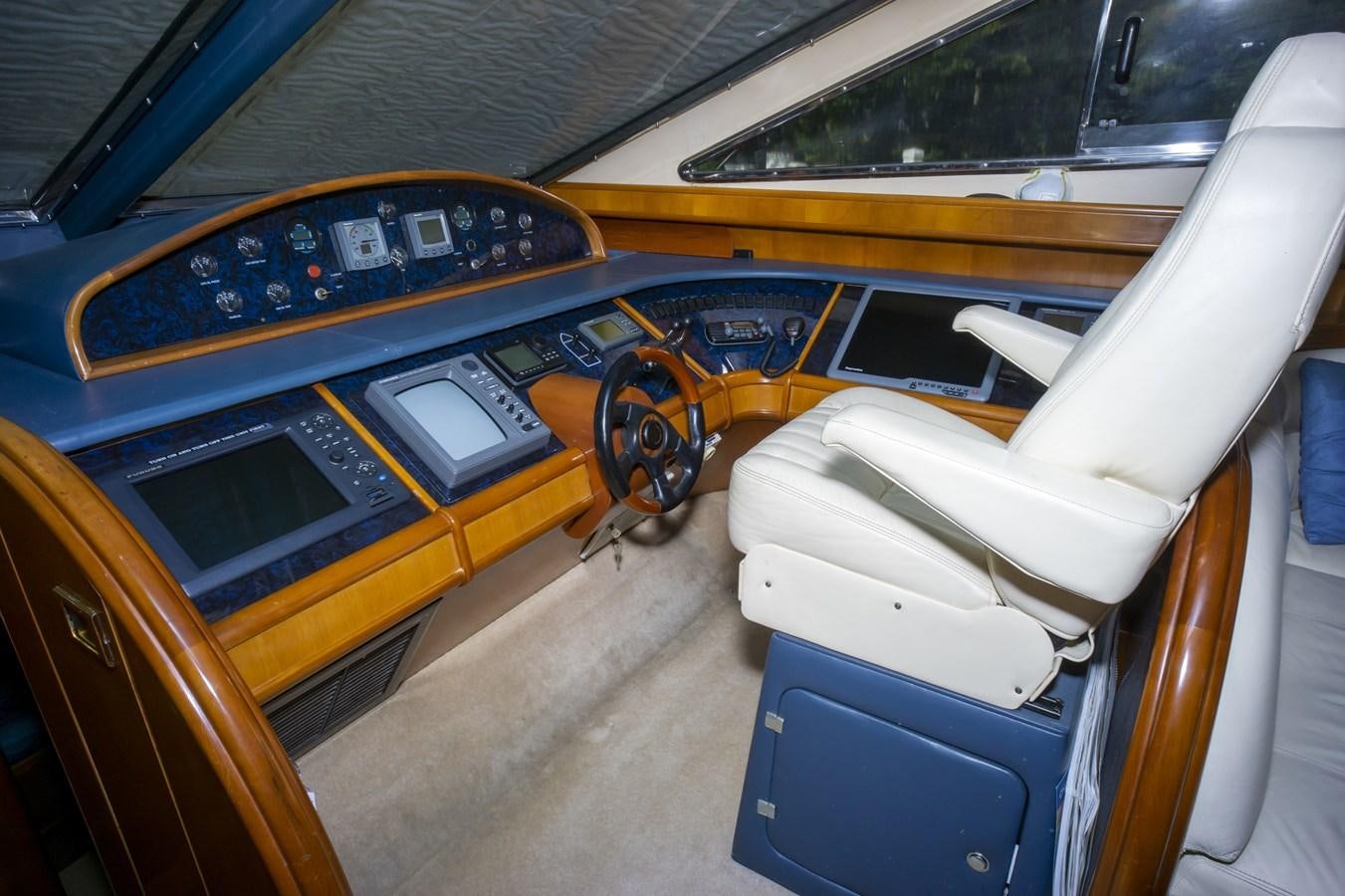 the inside of a car aboard KARTESSA III Yacht for Sale