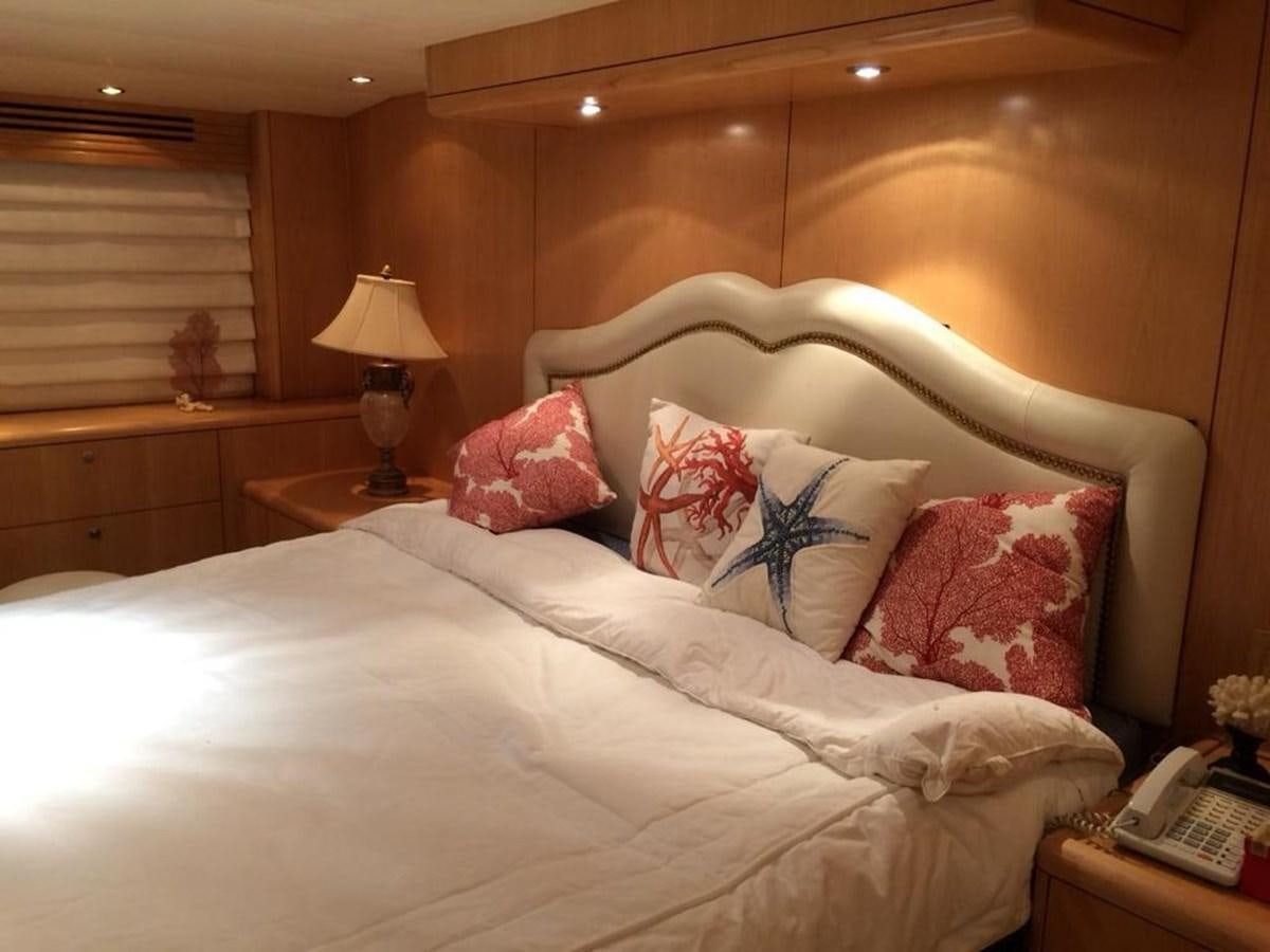 a bed with pillows aboard IN FLIGHT Yacht for Sale