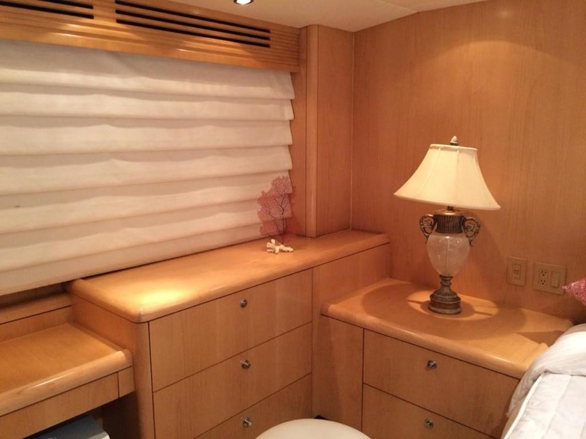 a lamp on a table aboard IN FLIGHT Yacht for Sale