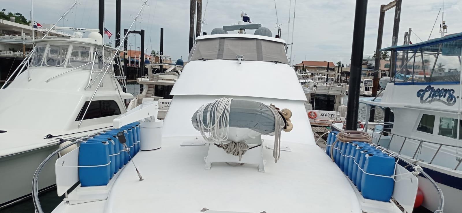 several boats are parked in a harbor aboard IN FLIGHT Yacht for Sale