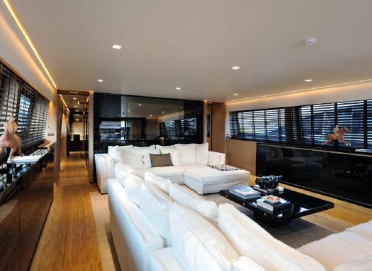 a living room with a large window aboard BERTONA III Yacht for Sale