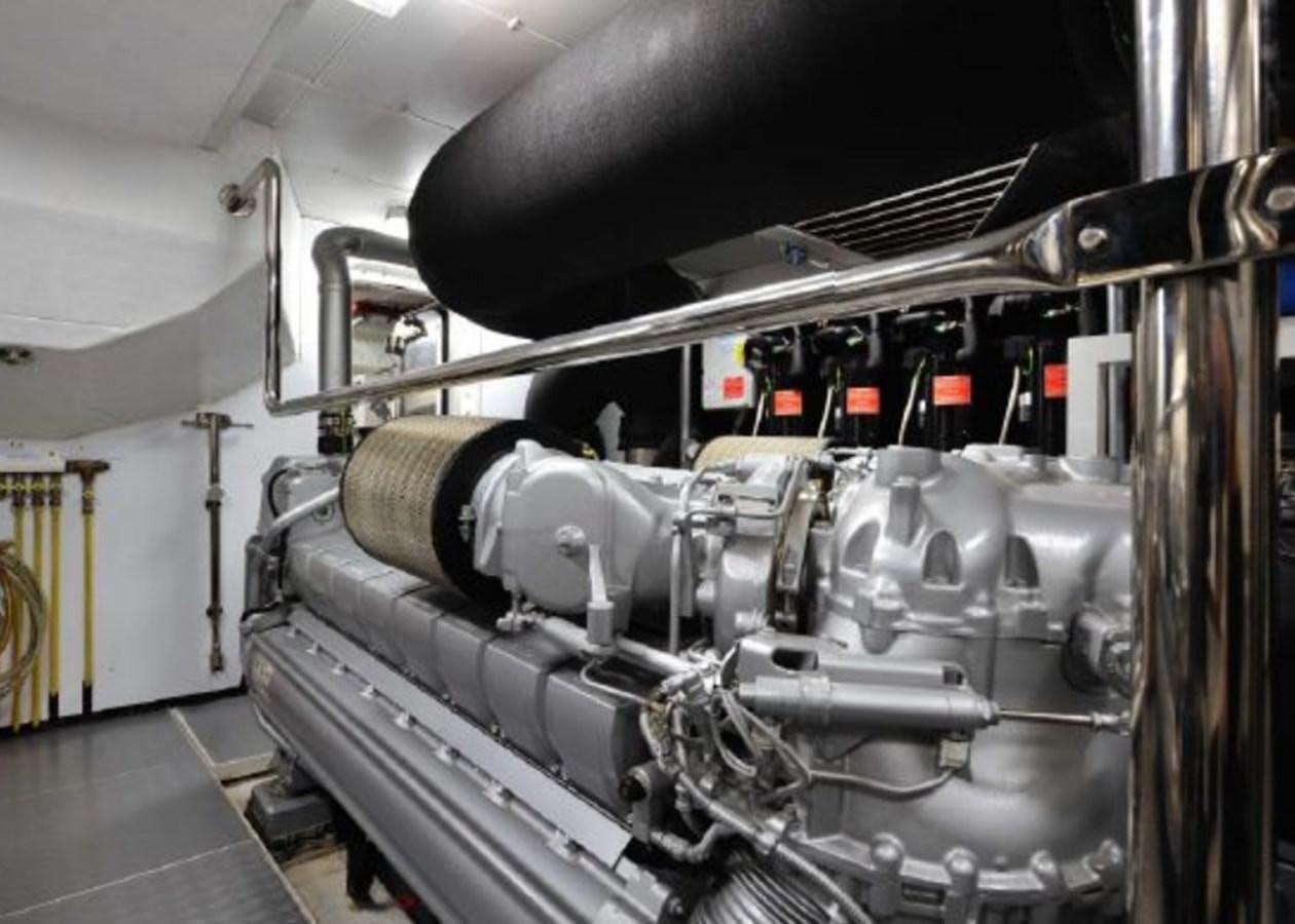 a machine with a large metal cylinder aboard BERTONA III Yacht for Sale