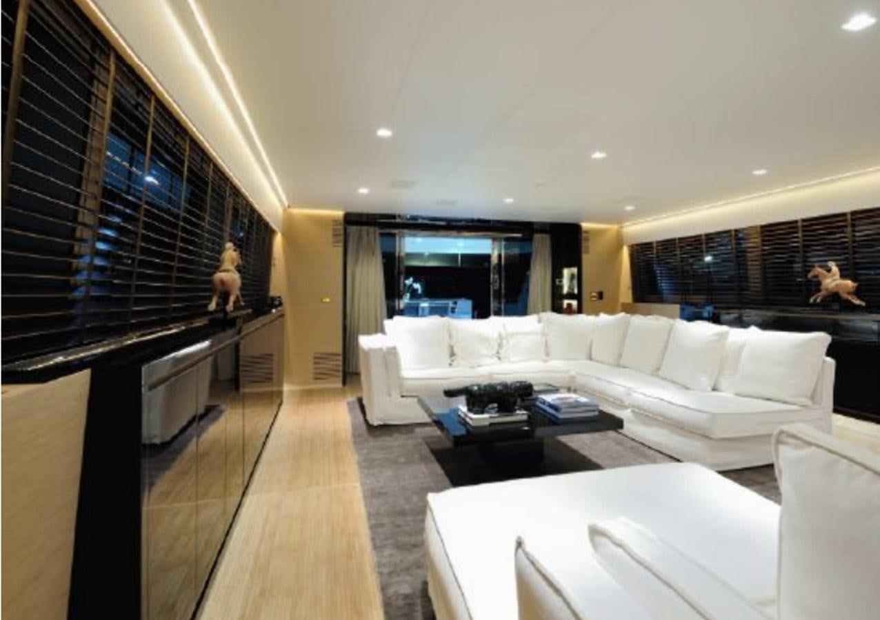 a living room with a large window aboard BERTONA III Yacht for Sale