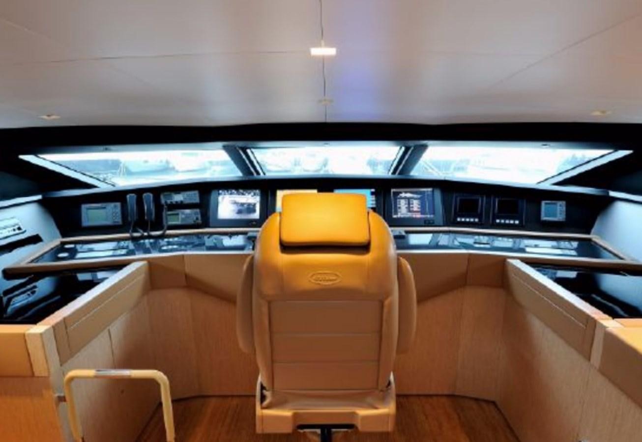 an empty chair in a room aboard BERTONA III Yacht for Sale