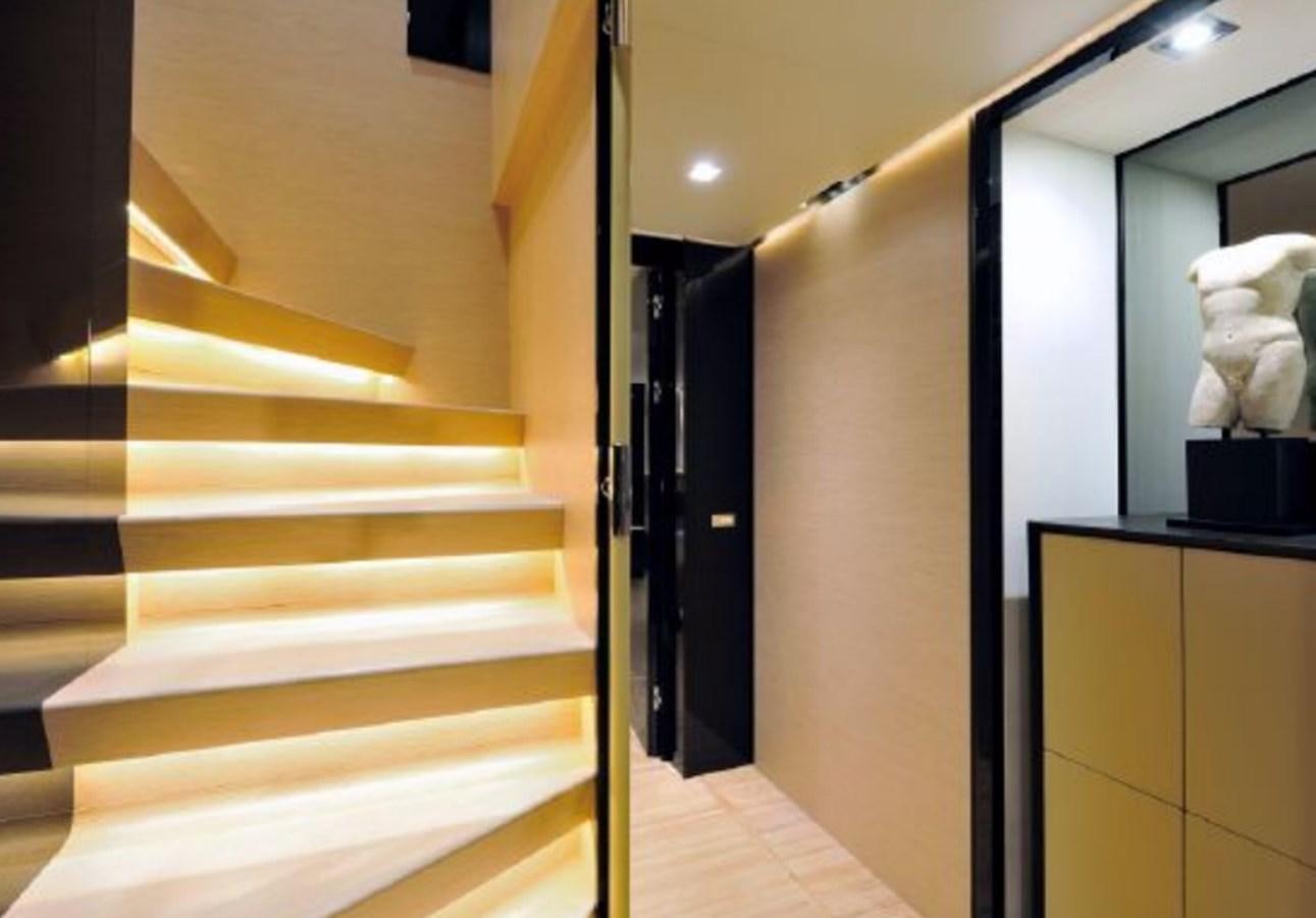 a staircase in a room aboard BERTONA III Yacht for Sale