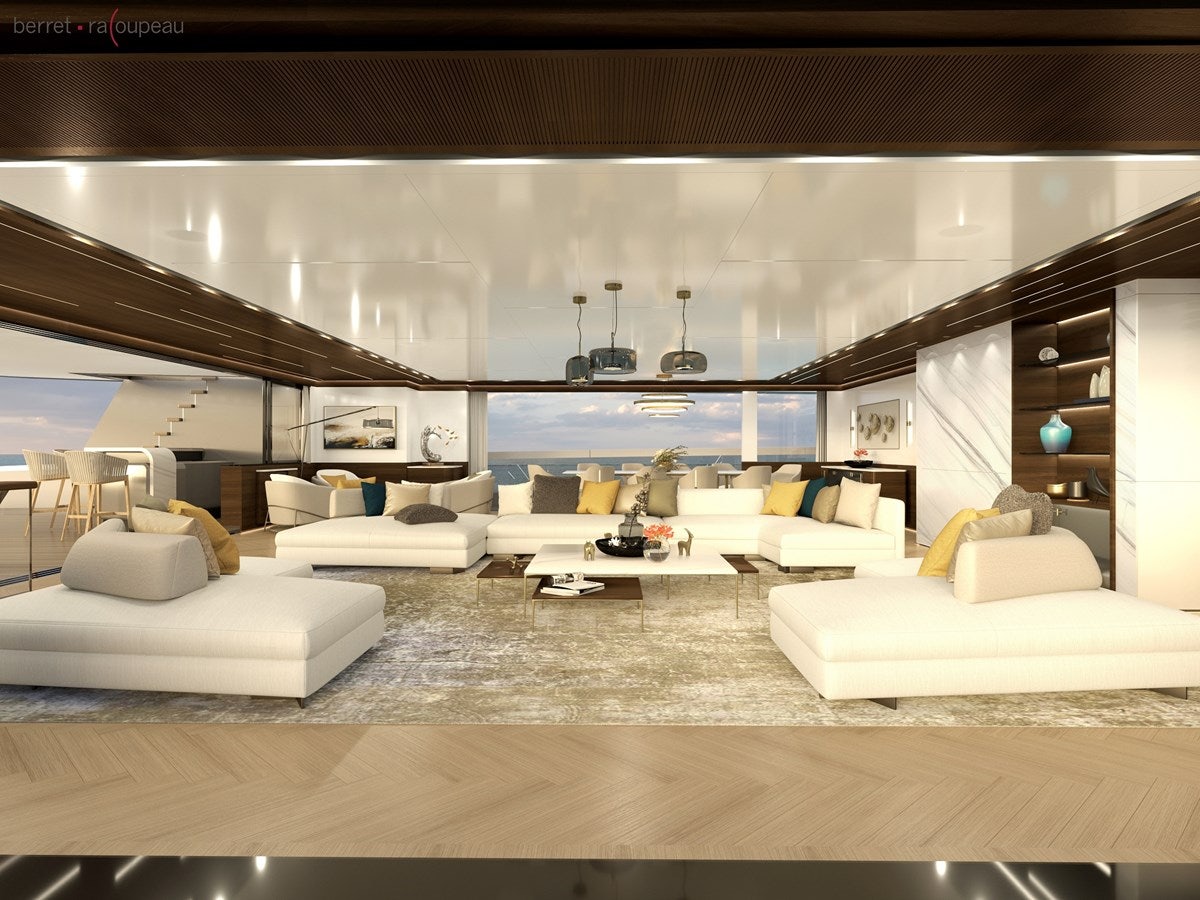 a room with couches and a table aboard ZEFFIRO 150' Yacht for Sale