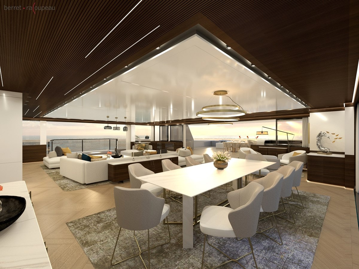 a room with a table chairs and a couch aboard ZEFFIRO 150' Yacht for Sale