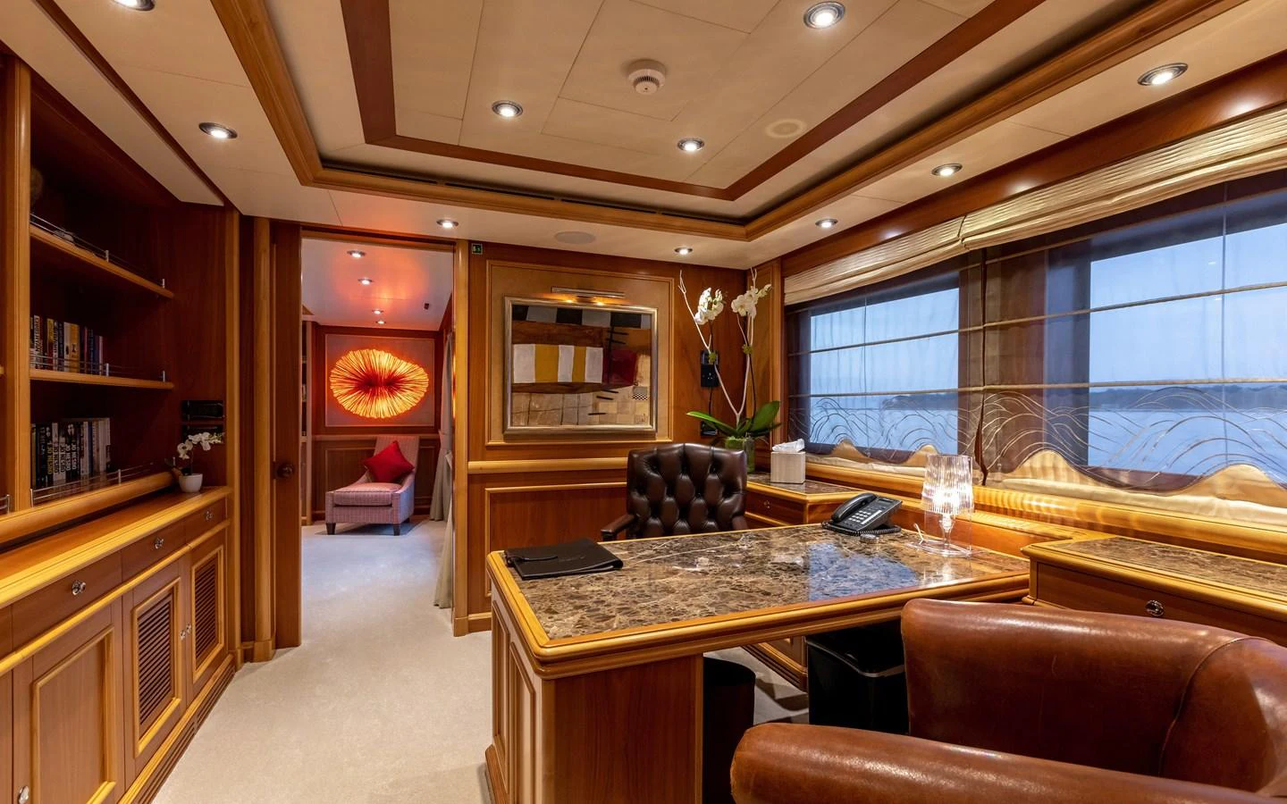 a living room with a table and chairs aboard EMOTION 2 Yacht for Charter
