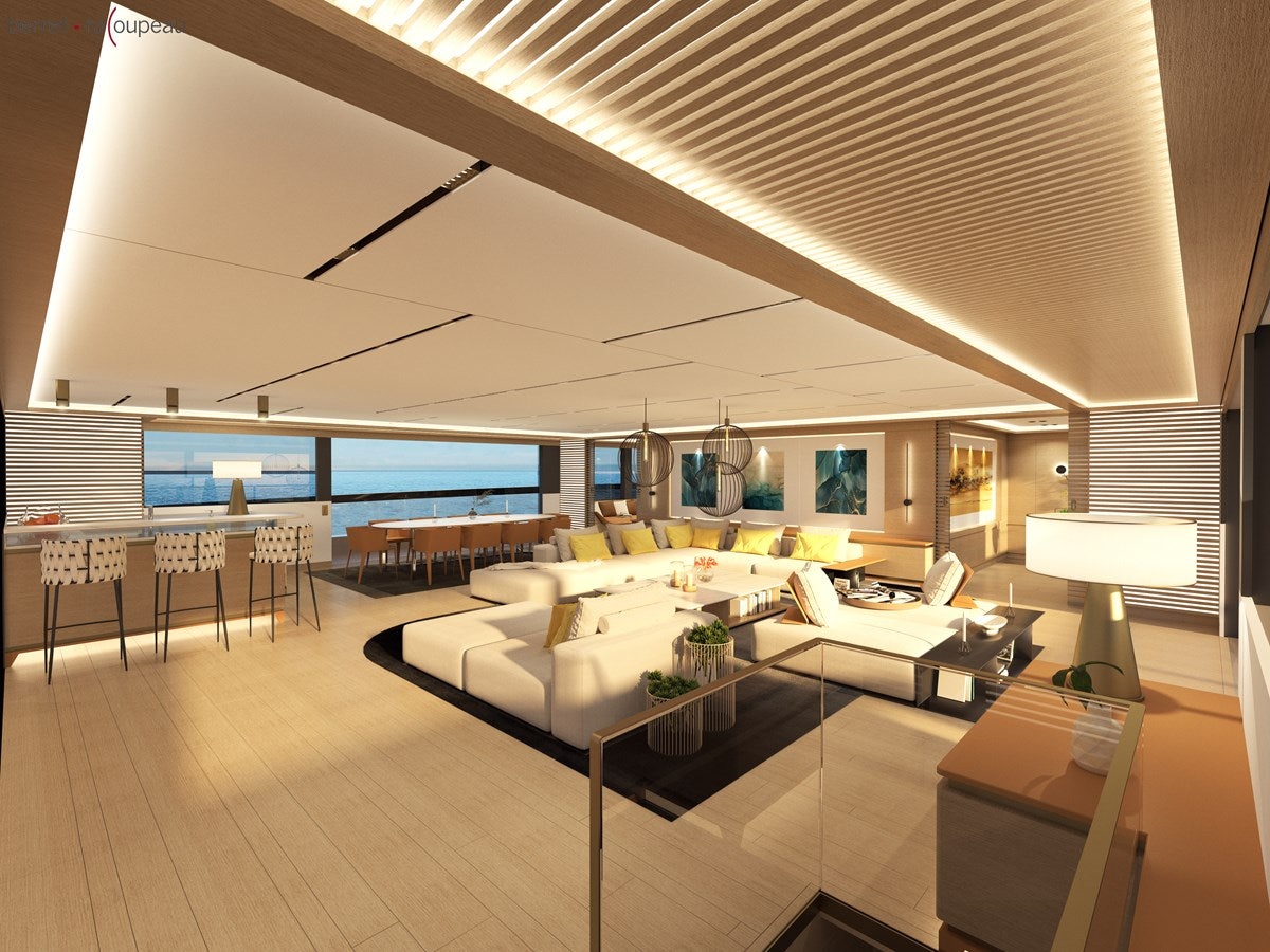 a room with a couch and a table aboard ZEFFIRO 130' Yacht for Sale